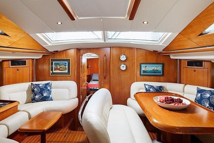 a bedroom with a desk and chair in a room