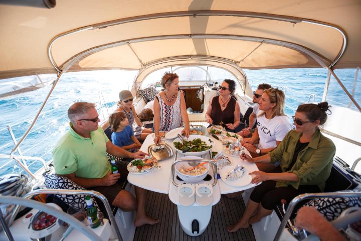a group of people sitting at a table