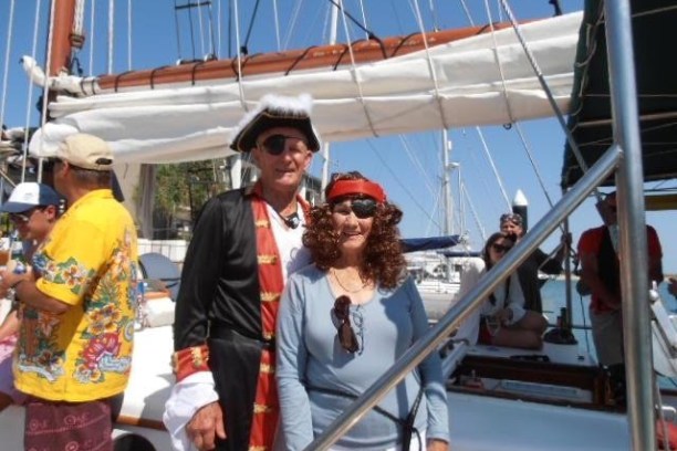 a man standing in front of a boat