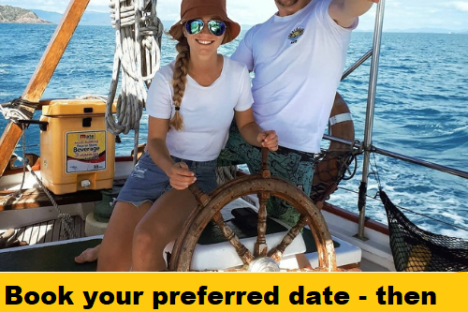 a person standing next to a body of water