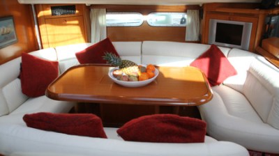 a living room filled with furniture and a flat screen tv