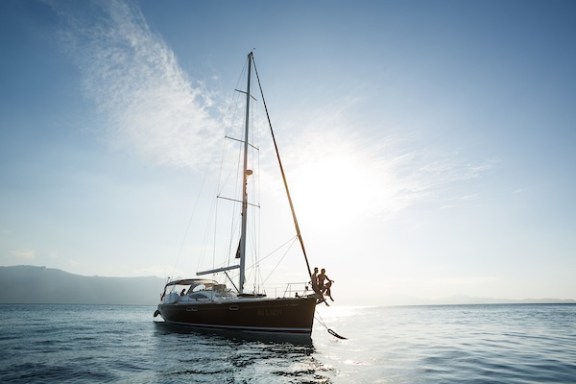 a small boat in a large body of water